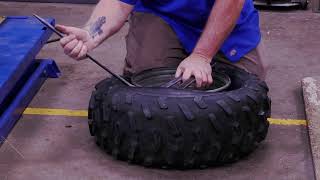 Changing an ATV Tire with Hand Tools amp Coats 220 [upl. by Hurst]