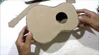 How to make an Acoustic Guitar from cardboard [upl. by Ardnoet144]